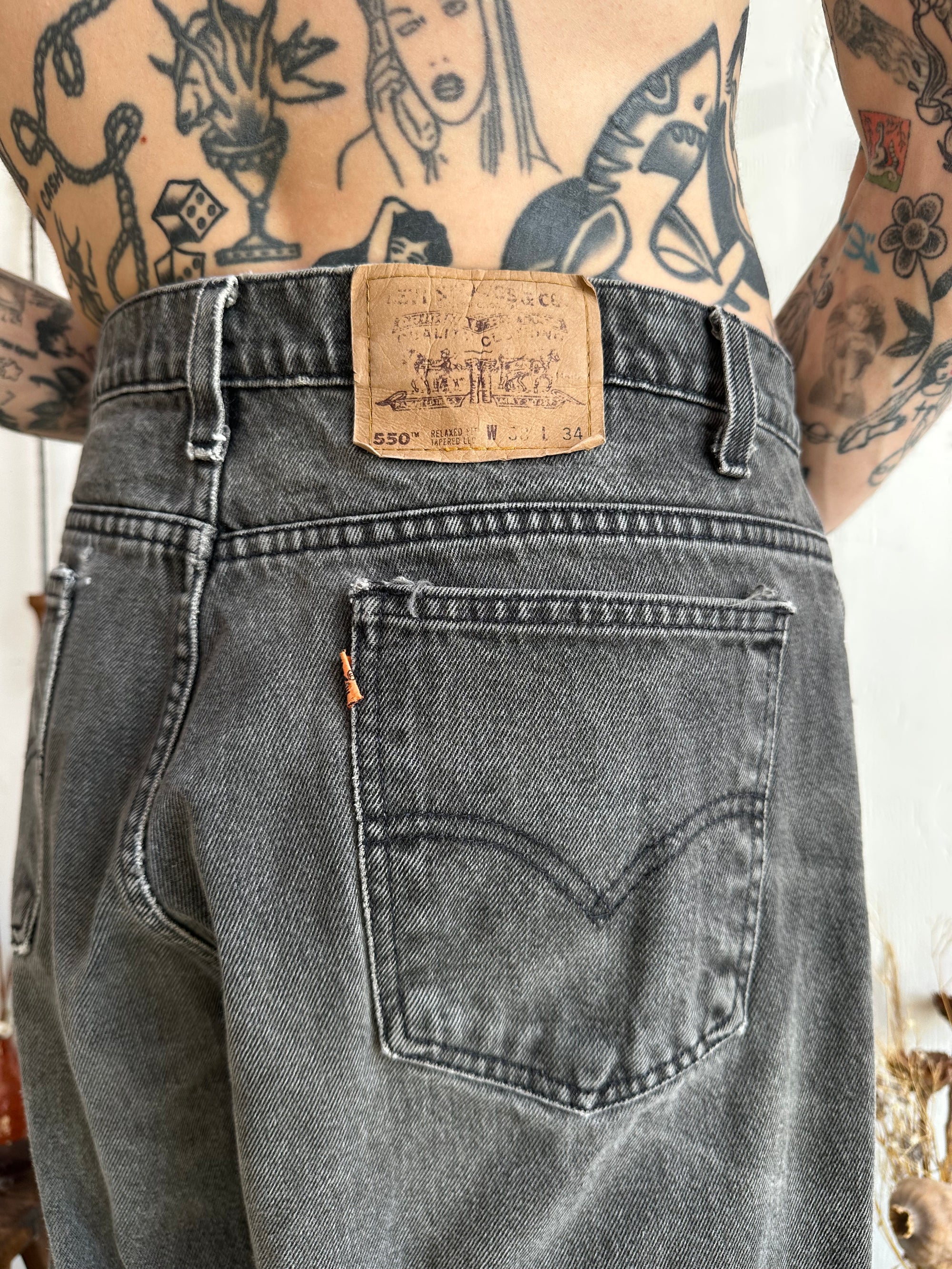 1990s Faded Orange Tab Levis 550s