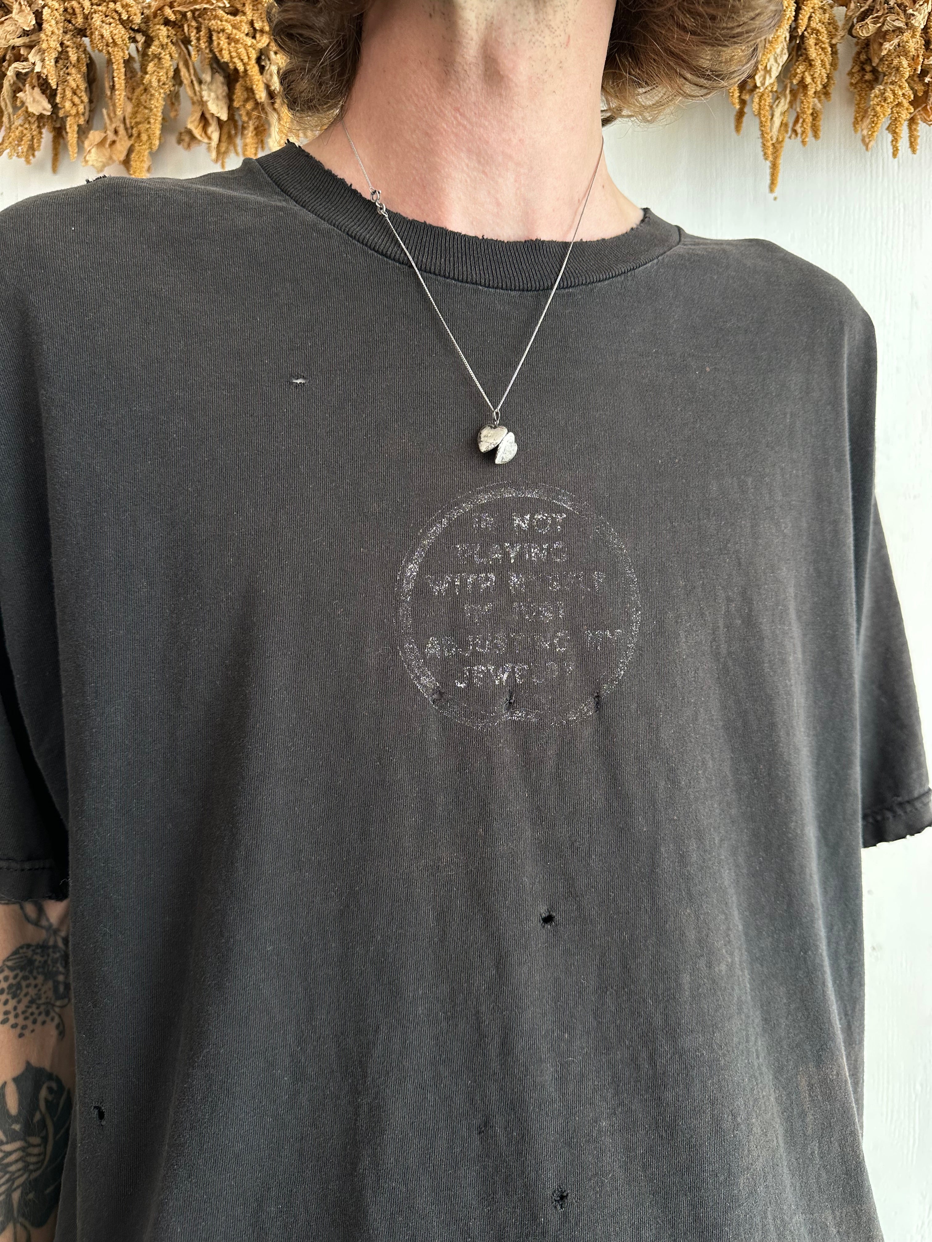 1990s Well Worn Adjusting My Jewelry Fashion Victim T-Shirt (XL)