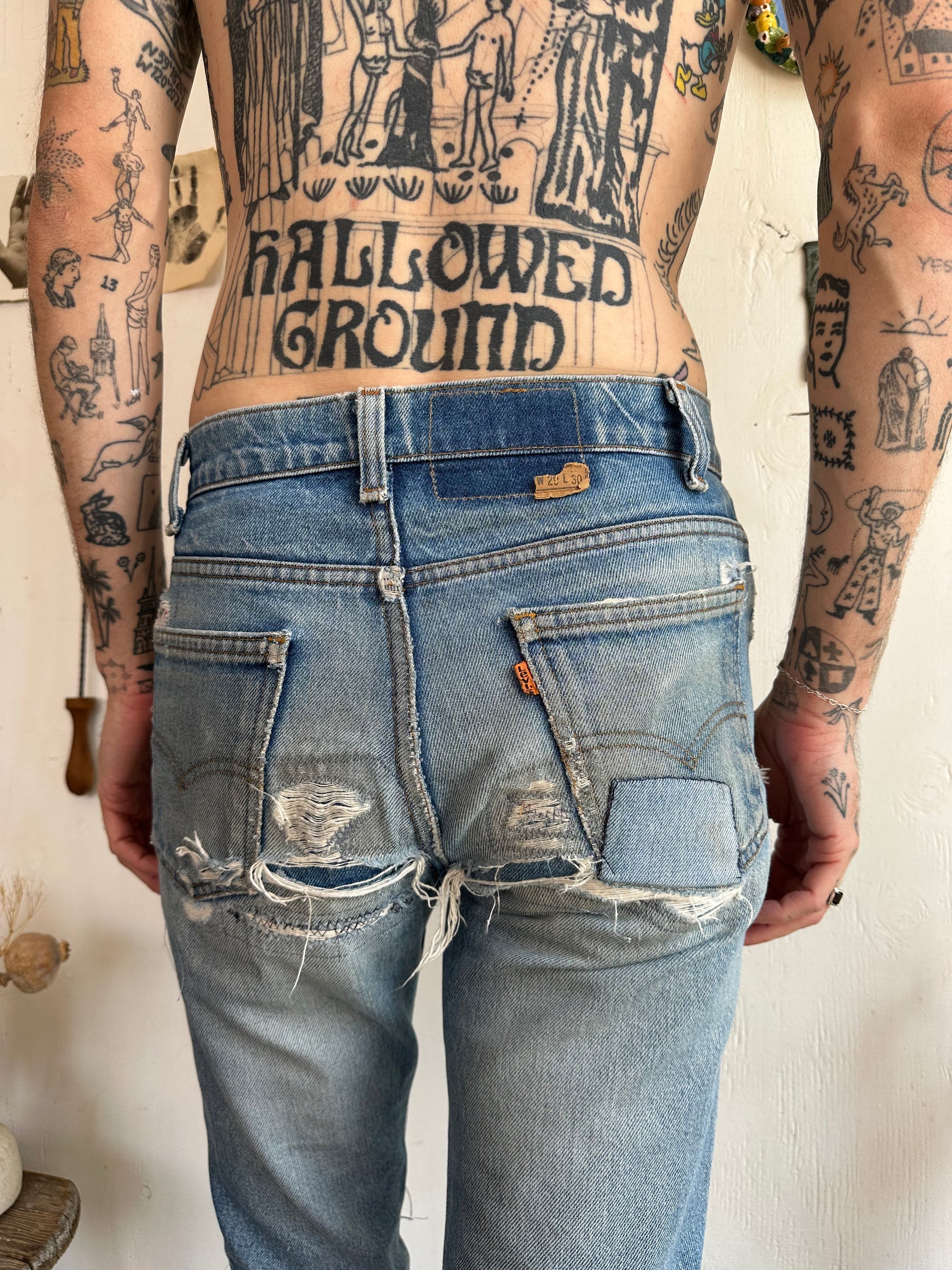 1970s Heavily Patched Orange Tab Levis Cropped Flares