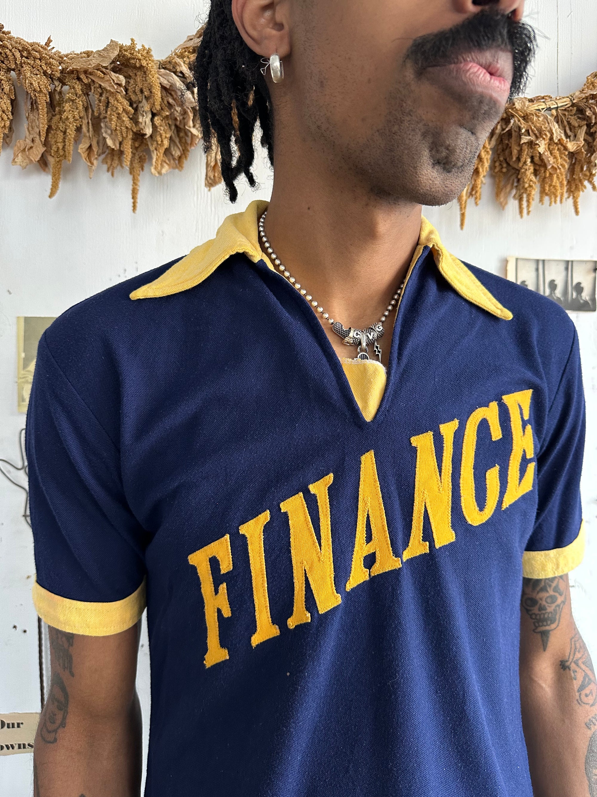 1970s Finance Polo Tee