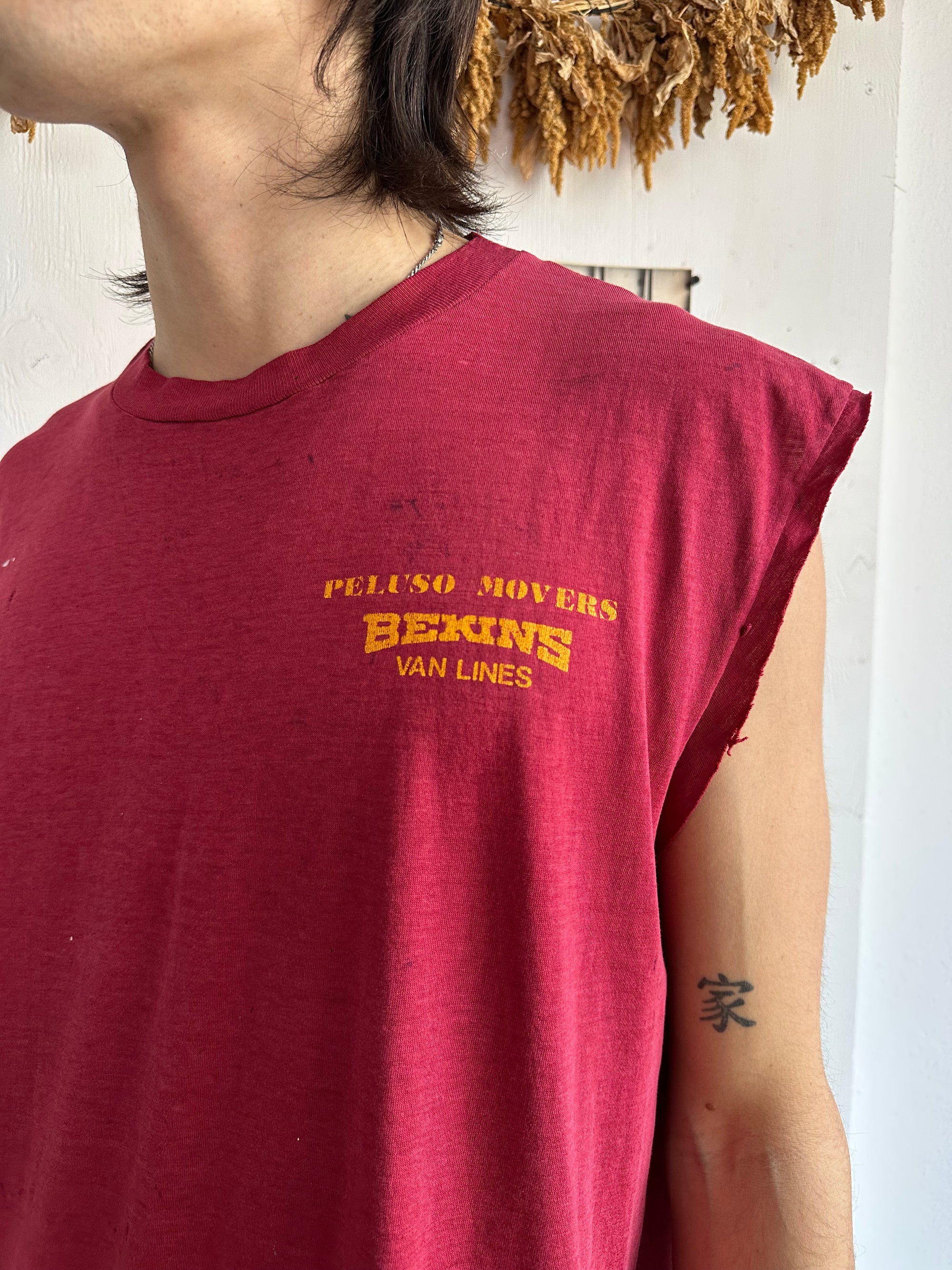 1980s Thrashed and Paper Thin Peluso Movers Muscle Tee