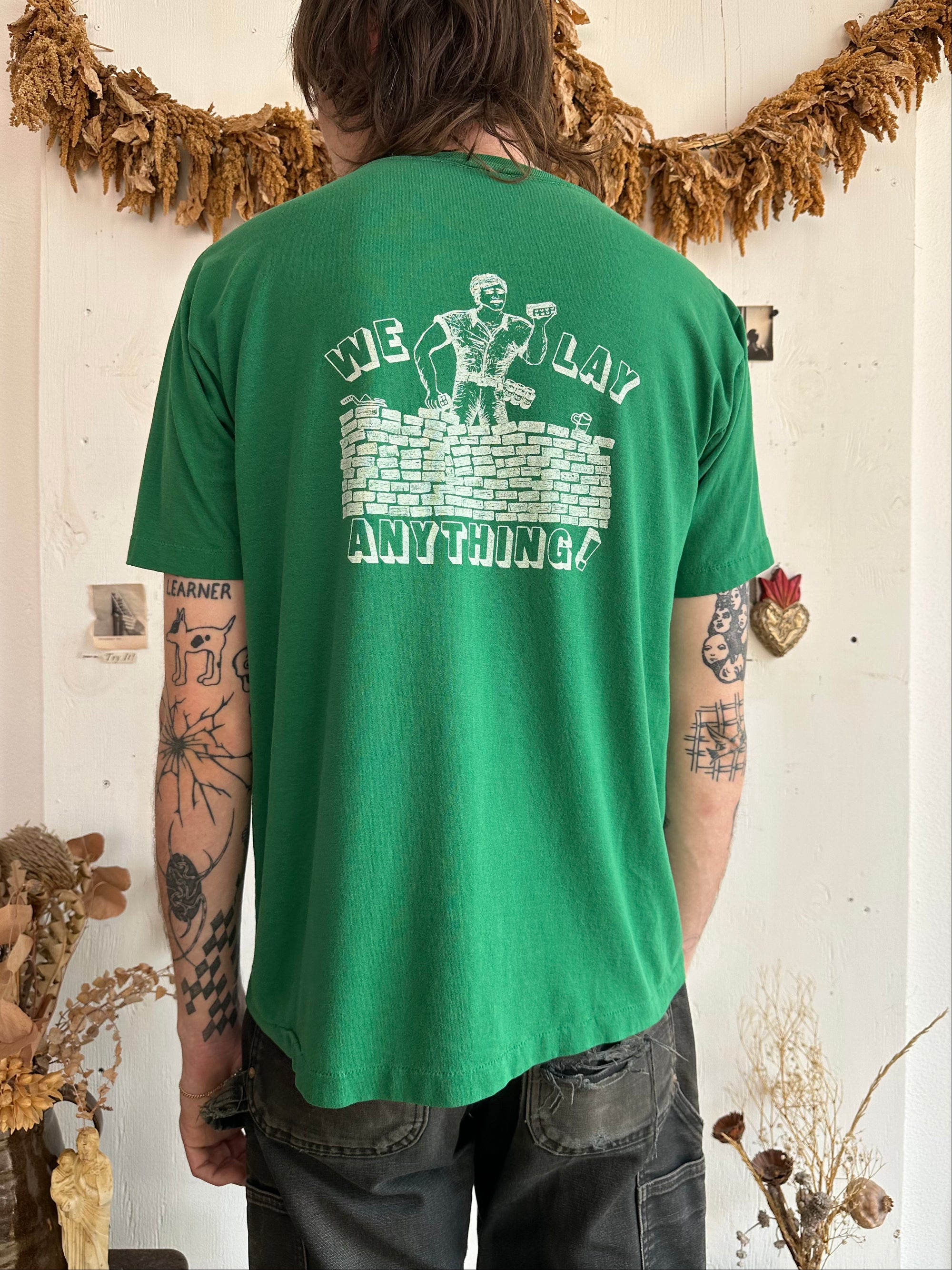 1970s We Lay Anything Pocket Tee