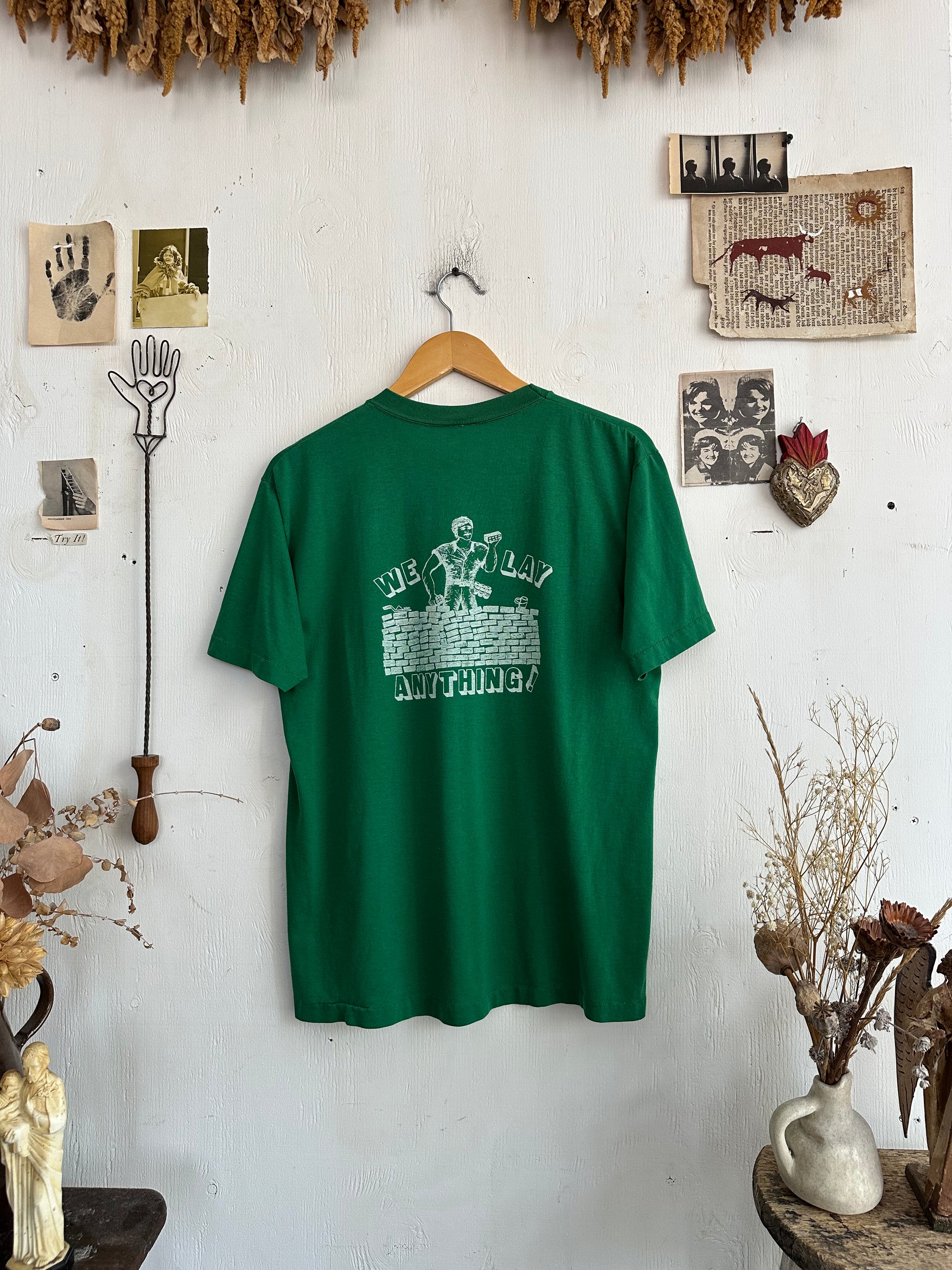 1970s We Lay Anything Pocket Tee